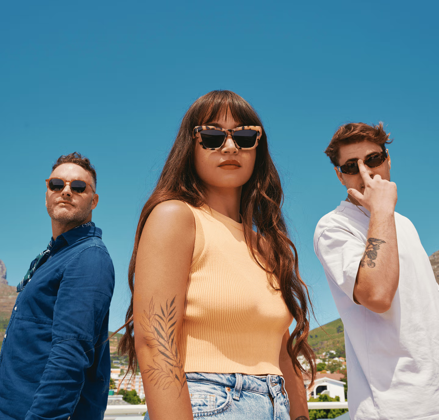 Creative team outdoors in sunglasses